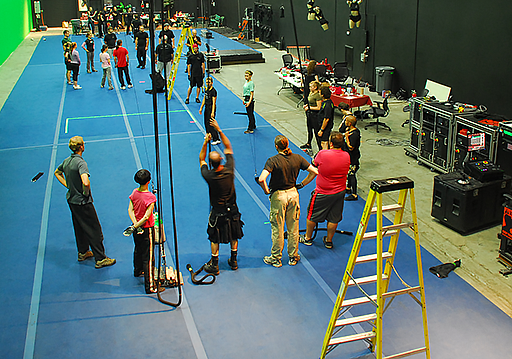 Performers practicing with flying rigging